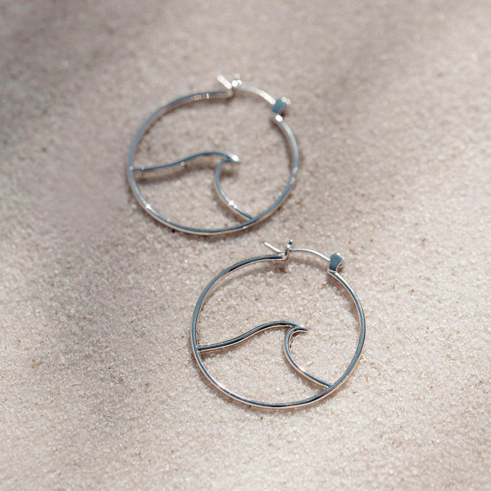 1690-large-wave-hoop-earrings-4.webp Large Wave Hoop Earrings